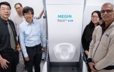 Video: Group standing with MEG machine